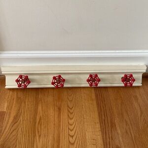 Clever Hanger from Plumbing Supplies.